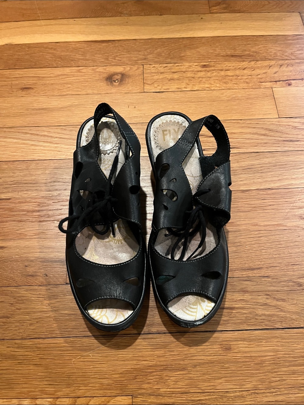 Fly London Black Lace-Up Cutout Leather Slingback Sandals